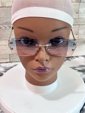 Rimless Pink Gradient Sunglasses with Gold Accents